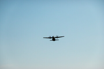 Military transport turboprop aircraft in flight