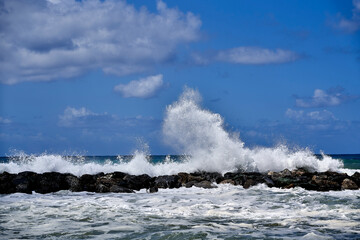 Waves crashing on rocks at Tyrrhenian Sea