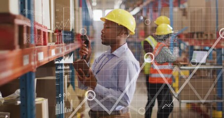 Man raising scanner, scanning inventory barcodes while colleague typing, displaying chart overlays - Powered by Adobe