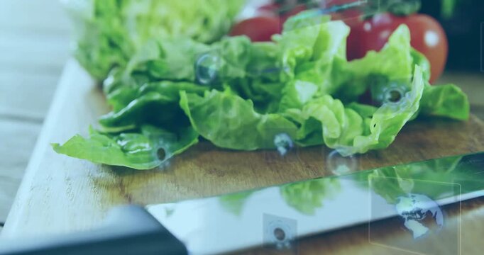 After digital scan activation icons drifting over lettuce leaves visualizing nutritional data
