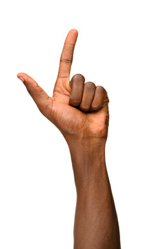 A raised hand making an "L" shape gesture with the thumb extended sideways and the index finger pointing upward, isolated on a transparent background.