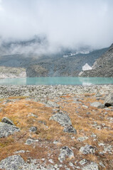 View of Upper Akchan lake in late august, glacial lake located in the Altai mountains, Russian Federation
