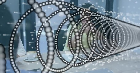 Business team writing notes as rings entering from right representing data sweeping exiting left - Powered by Adobe