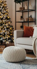 Cozy living room decorated for Christmas with tree and pouf.