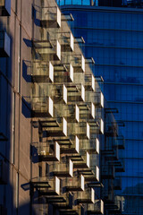 Glass balconies in multi-family buildings, apartment density, real estate, and housing market.