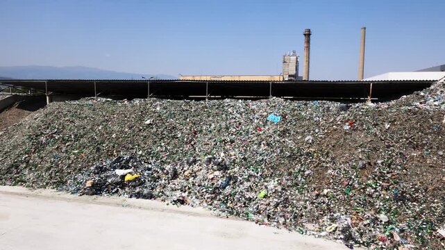 A waste sorting facility, also known as a Materials Recovery Facility (MRF) or recycling center, is a specialized plant that receives and separates mixed waste to isolate recyclable materials.