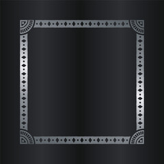 Ornate Silver Frame on Dark Background.