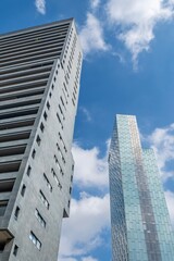 Obraz premium Modern Glass And Concrete Skyscrapers Against Blue Sky In Barcelona Spain. Contemporary Architecture, High Rise Buildings, Business District
