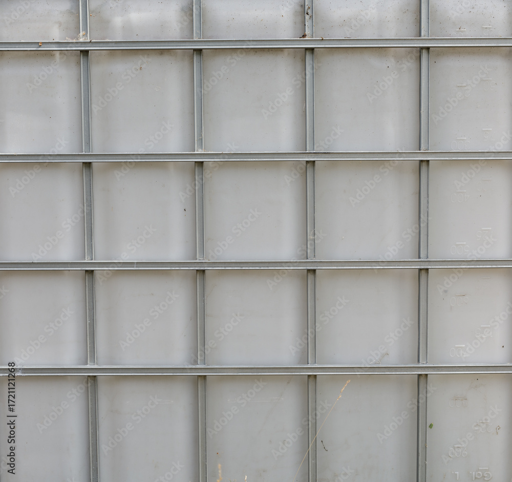 Poster high-resolution image of a grey plastic tank with a grid pattern. ideal for industrial backgrounds.