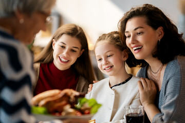 Family celebrating Thanksgiving Day