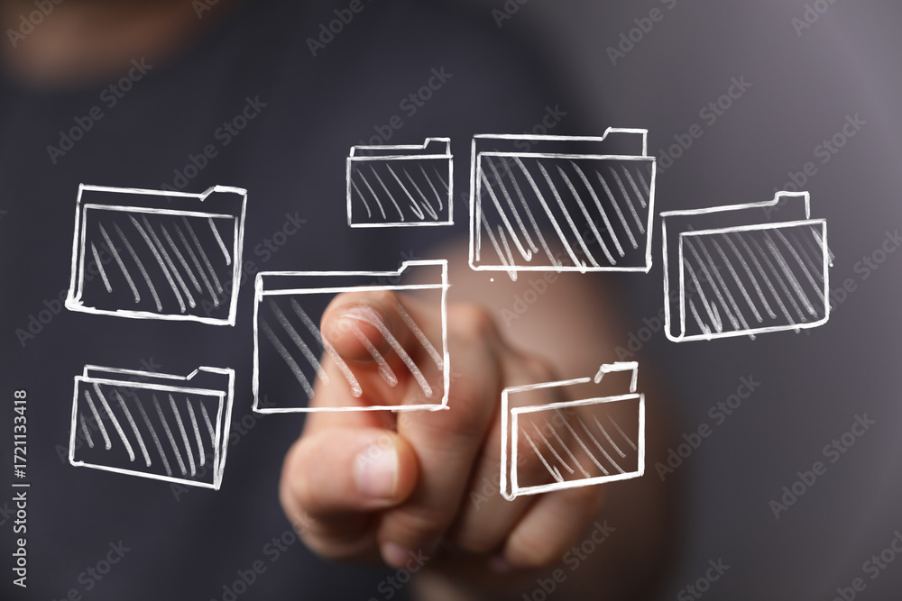 Poster hand points to drawn folders, symbolizing data access, cloud storage, and file management. perfect f