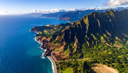 Aerial view of a dramatic coastline with towering mountains