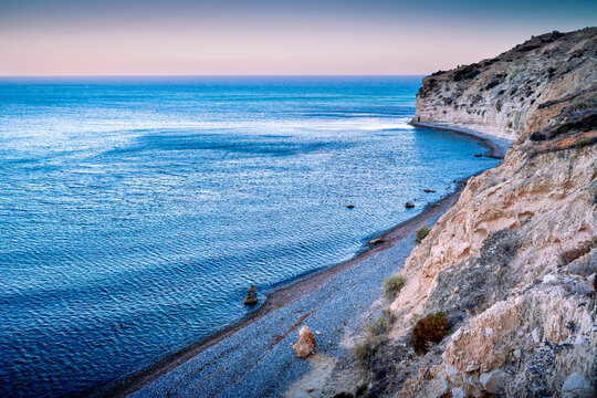 Pissouri Bay Beach near Paphos. Stunning Cypriot island landscape at sunset. Mediterranean natural landscapes.