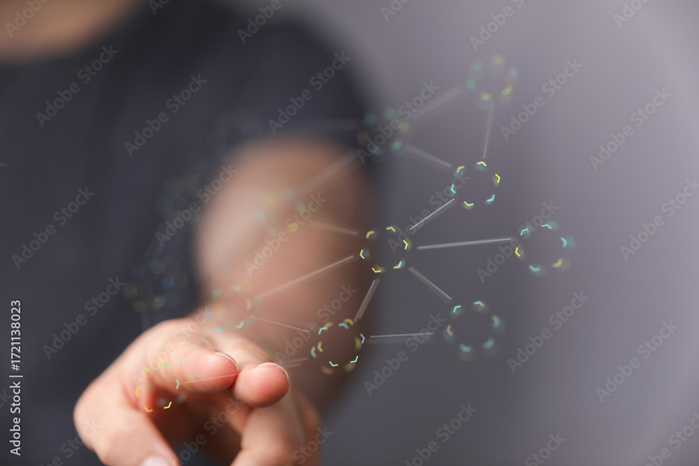 Poster abstract image of a hand interacting with a digital network connection, representing technology, com