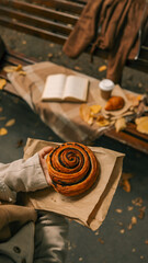 Autumn picnic scene with pastry and coffee