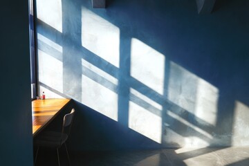 Sunlight Casting Shadows on a Minimalist Interior with Table and Chair Highlighting Tranquil Atmosphere