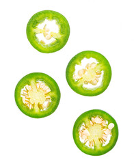 Fresh jalapeno pepper isolated on white background. Slices of green hot serrano pepper. Clipping path. Top view.