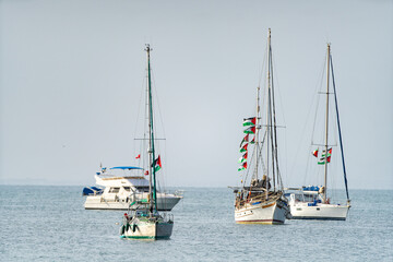 Obraz na płótnie Canvas The Sumud Flotilla anchored off the coast of Sidi Bou Said, Tunisia, during its voyage as part of an international solidarity initiative to support Gaza