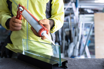 Craftsmen use general and industrial silicone glue.