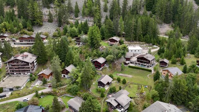 4K High resolution aerial drone video of the beautiful town of Champex Lac Switzerland one of the gems that the TMB- Tour du Mont Blanc goes through with small houses and a beautiful lake