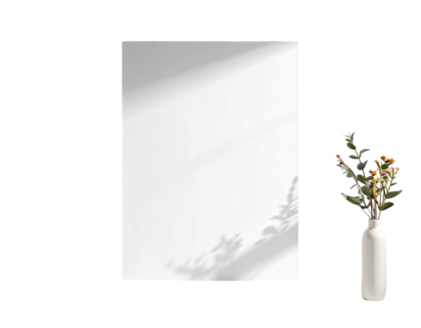 Blank white poster or canvas, with natural shadows and a small vase of dried flowers