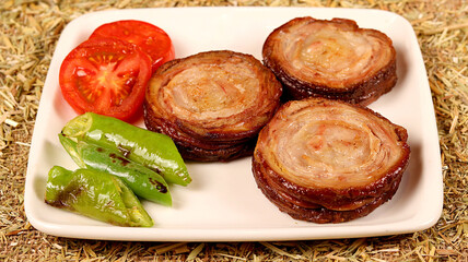 3 kokorech cut into one portion