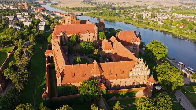 Drone orbit cinematic, Malbork castle fortress in Poland showing medieval legacy