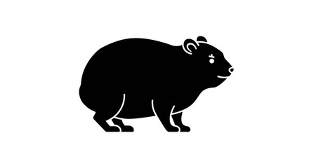 Chunky black silhouette of a wombat standing alertly on a