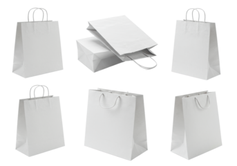 Six blank white paper bags, twisted handles, natural texture, various angles, on white background copy space, high-key product photography, sustainable packaging concept