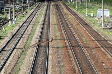 Obraz premium The photo illustrates rails that carry trains toward the unexplored