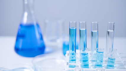 Laboratory glassware test tube beaker flask pipette science research experiment education hospital analysis vaccine antibiotic development DNA chemist biochemistry biotechnology discovery innovation