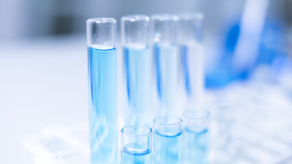 Close-up of laboratory glassware equipment test tube beaker flask scientific experiment pharmaceutical healthcare and medicine DNA vaccine innovation development research experiment analysis education