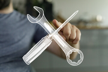 Obraz premium Hand pointing at digital tools icons - wrench and screwdriver. Repair, maintenance, solution concept.