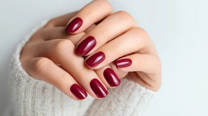 Fotobehang Nagelstudio Glamorous red manicure art beauty salon hand model close-up glossy red nails fashion nails environment  © thiwaporn