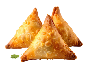 Golden-brown, crispy triangular pastries, likely samosas, arranged on a dark background