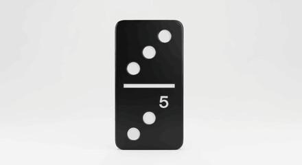Dominos games concept featuring black domino tile showing 5 and 2 spots in minimal studio setting
