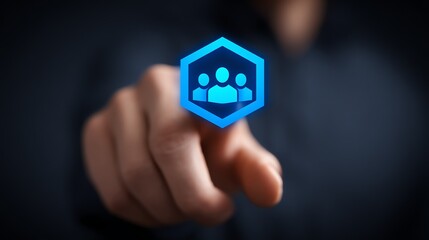 A focused hand reaches towards a glowing hexagonal icon depicting three silhouetted figures, symbolizing connection, teamwork, or user access in a modern digital context.