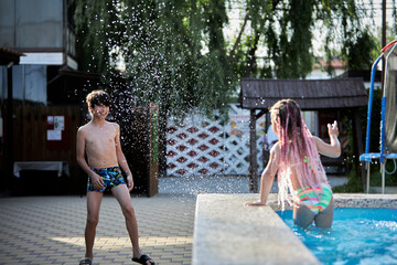 Boy enjoys water fun at an aquapark