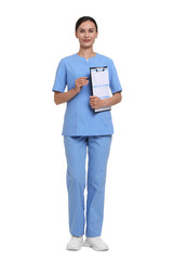 Nurse in uniform with patient's medical card on white background