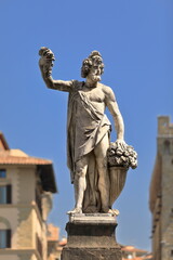 Obraz premium Autumn by Giovanni Battista Caccini, allegorical statue from AD 1608 placed at the southwest end of Ponte Santa Trinita Bridge. Florence-Tuscany-356