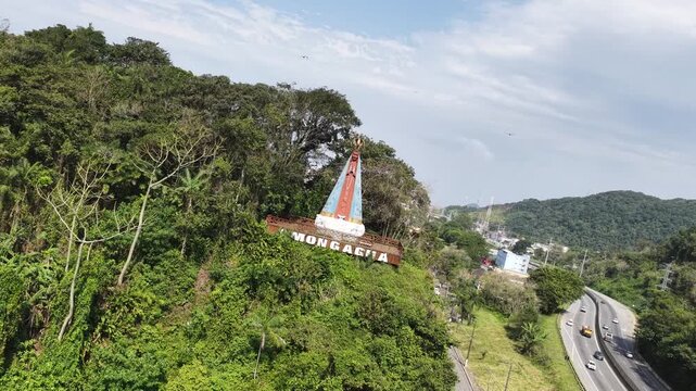 Religious Symbol Of Mongagua In Sao Paulo Brazil. Religious Skyline. Downtown Cityscape. Our Lady Of Aparecida Saint. Religious Symbol At Mongagua In Sao Paulo Brazil. Patron Saint Hill.