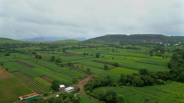 green farm land in Satara village drone shot