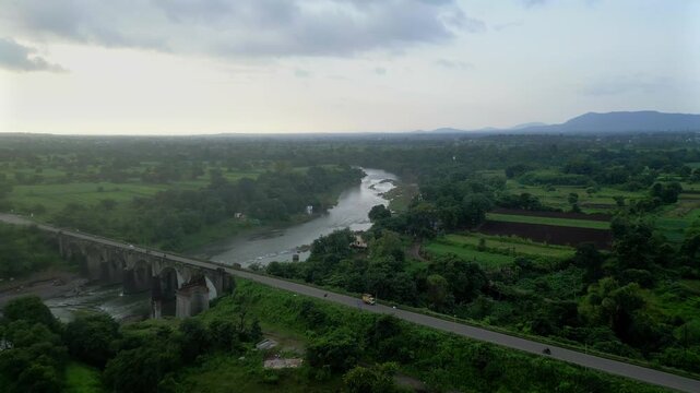 river goes from vilage road bridge satara drone view