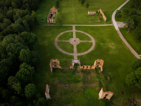 Aerial view of the Paulava Republic ruins and circular garden, where stone whispers echo across the manicured lawns, Merkine, alininkai, Lithuania.