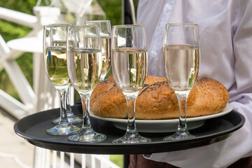 glasses of champagne and cake