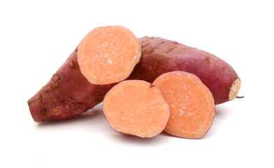 Close-up of three Raw sweet potatoes