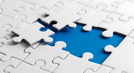 White jigsaw puzzle pieces with a missing piece revealing a blue background, symbolizing a gap or solution