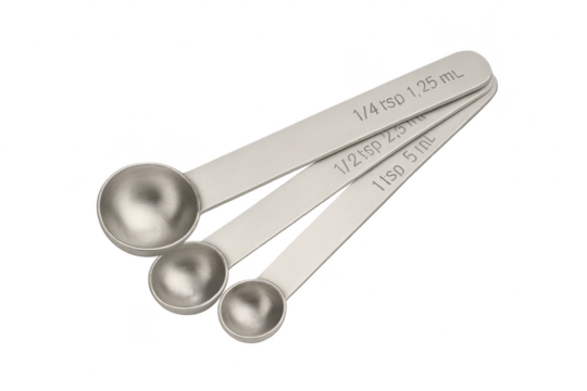 Stainless steel measuring spoons set, accurately isolated on transparent background.