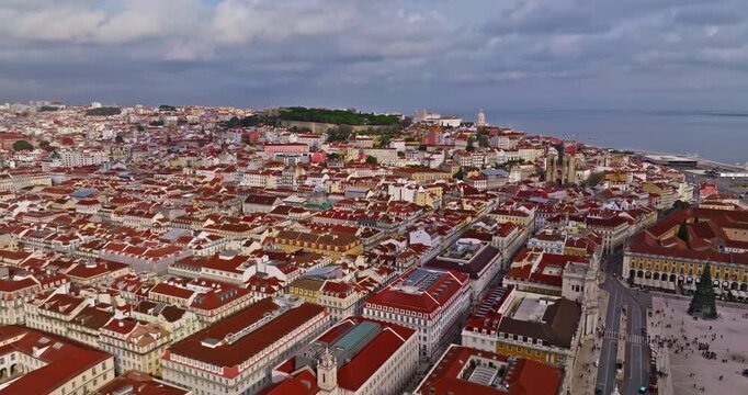  Aerial view on old center Alfama, district of Lisbon with Saint Stephen Church. Lisbon, Portugal