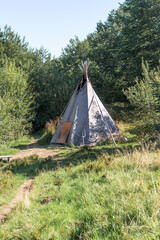Summer Wigwam on Forest Glade in Carpathian Mountains © Alla